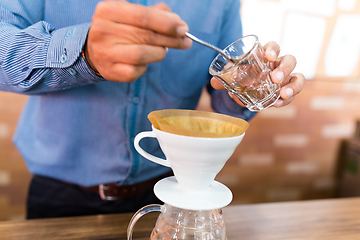 Image showing Barista making of hand drip coffee in cafe