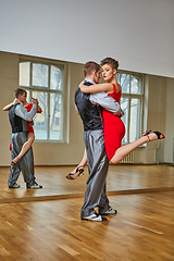 Image showing beautiful couple dancing tango