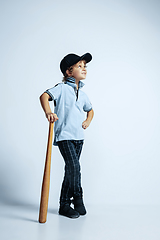 Image showing Pretty young boy in casual clothes on white studio background