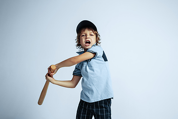 Image showing Pretty young boy in casual clothes on white studio background