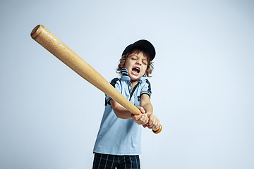 Image showing Pretty young boy in casual clothes on white studio background