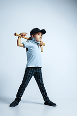 Image showing Pretty young boy in casual clothes on white studio background