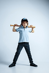 Image showing Pretty young boy in casual clothes on white studio background