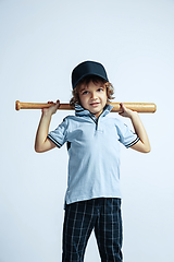 Image showing Pretty young boy in casual clothes on white studio background