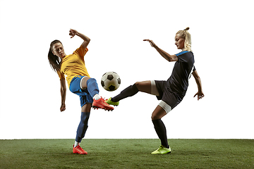 Image showing Female soccer players practicing and training at the stadium