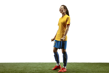 Image showing Female soccer player practicing and training at the stadium