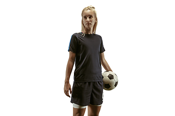 Image showing Female soccer player practicing and training at the stadium