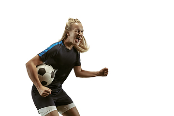 Image showing Female soccer player practicing and training at the stadium