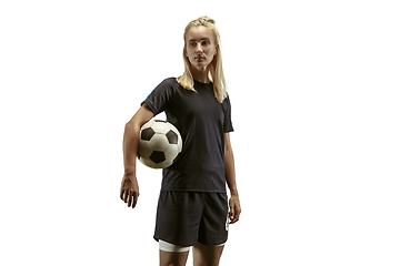 Image showing Female soccer player practicing and training at the stadium