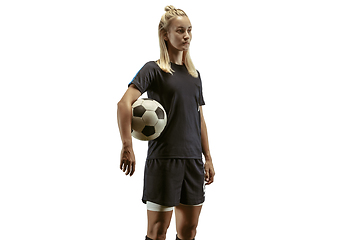 Image showing Female soccer player practicing and training at the stadium