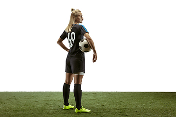 Image showing Female soccer player practicing and training at the stadium