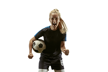 Image showing Female soccer player practicing and training at the stadium