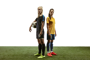 Image showing Female soccer players practicing and training at the stadium