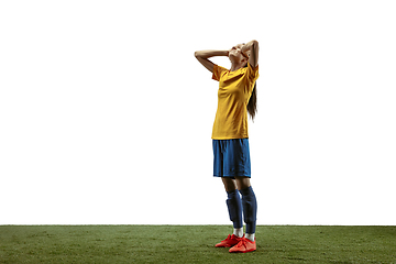 Image showing Female soccer player practicing and training at the stadium