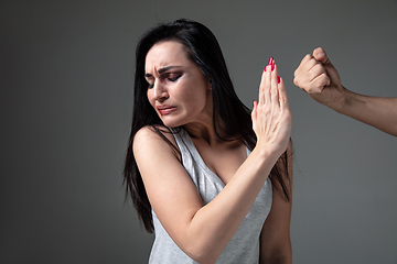 Image showing Woman being under domestic abuse and violence, concept of female rights