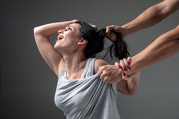 Image showing Woman being under domestic abuse and violence, concept of female rights