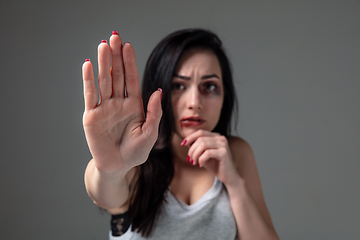 Image showing Woman in fear of domestic abuse and violence, concept of female rights