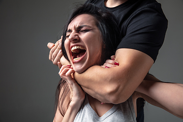 Image showing Woman being under domestic abuse and violence, concept of female rights