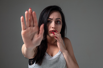 Image showing Woman in fear of domestic abuse and violence, concept of female rights