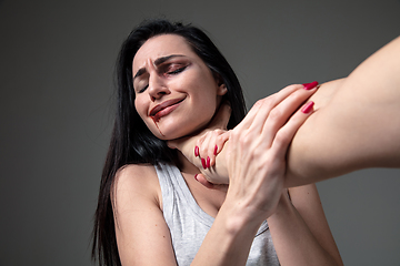 Image showing Woman being under domestic abuse and violence, concept of female rights