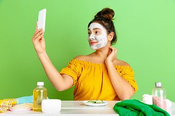 Image showing Portrait of young caucasian woman in her beauty day and skin care routine