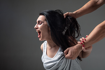 Image showing Woman being under domestic abuse and violence, concept of female rights