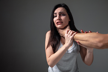 Image showing Woman being under domestic abuse and violence, concept of female rights