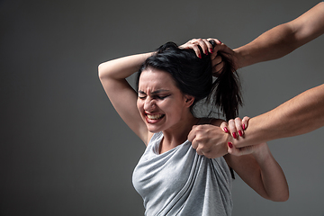 Image showing Woman being under domestic abuse and violence, concept of female rights