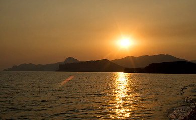 Image showing Sunset over the sea and mountains. Ukraine. Southern coast of Cr