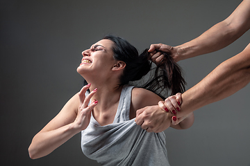 Image showing Woman being under domestic abuse and violence, concept of female rights