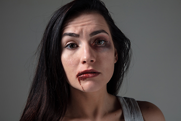 Image showing Woman in fear of domestic abuse and violence, concept of female rights