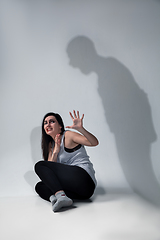 Image showing Woman being under domestic abuse and violence, concept of female rights