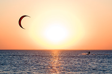 Image showing Kitesurfer on a gulf on a sunset