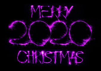 Image showing 2020 in neon multi colour, parallel lines pattern on black background