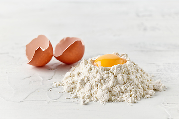 Image showing flour and egg yolk