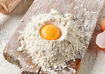 Image showing flour and egg yolk