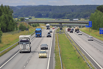 Image showing Motorway Traffic with Cars and Heavy Trucks