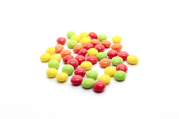 Image showing Bright multicolored candy on a white background