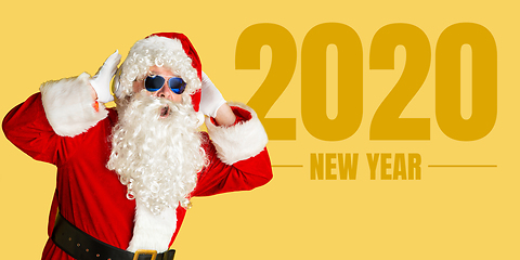Image showing Santa Claus isolated on yellow studio background