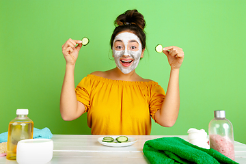 Image showing Portrait of young caucasian woman in her beauty day and skin care routine