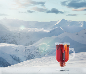 Image showing Mulled wine and landscape of mountains on background