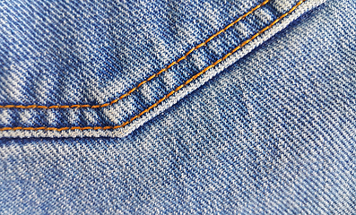 Image showing Fragment of classic blue fashioned jeans