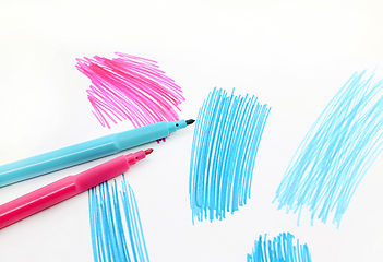 Image showing Two felt-tip pens on a white background with abstract drawings