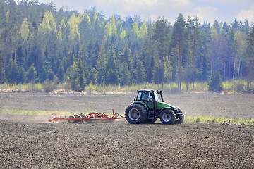 Image showing Deutz-Fahr Tractor and Harrow in Field