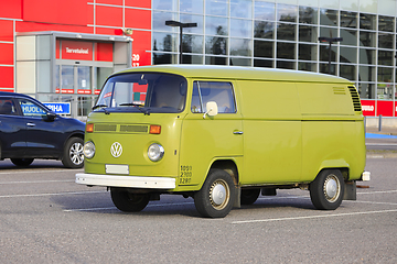 Image showing Green Volkswagen Camper Van Parked