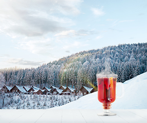 Image showing Mulled wine and landscape of mountains on background