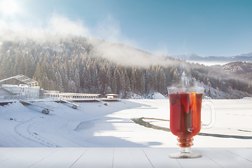 Image showing Mulled wine and landscape of mountains on background