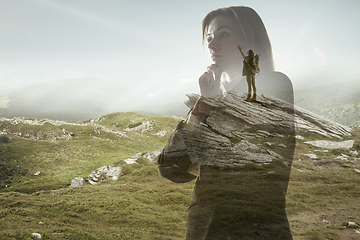 Image showing Silhouette of businesswoman with landscapes on background, double exposure.