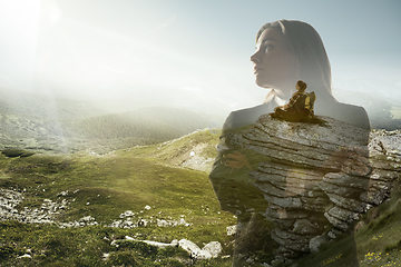 Image showing Silhouette of businesswoman with landscapes on background, double exposure.