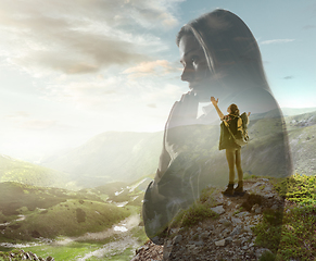 Image showing Silhouette of businesswoman with landscapes on background, double exposure.